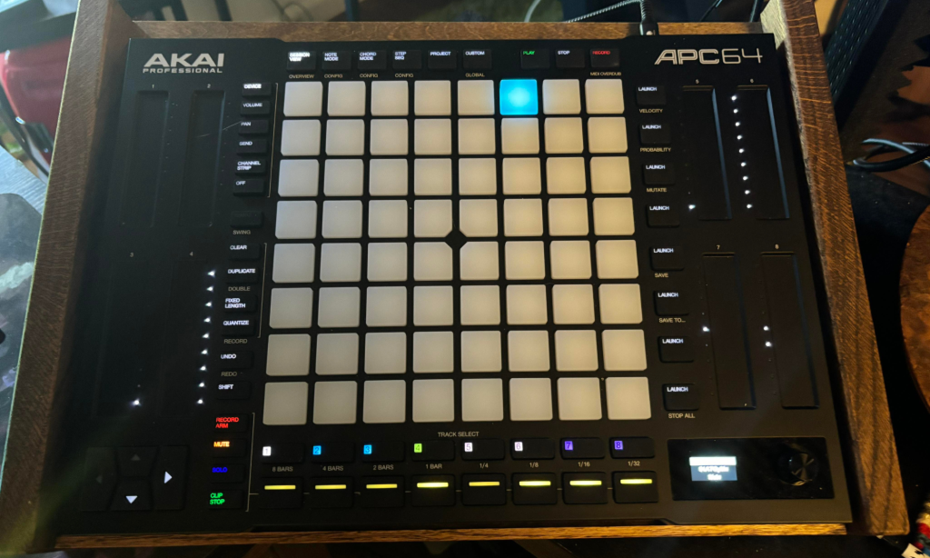 a black electronic device with many buttons